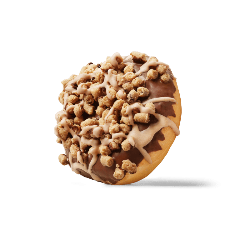Ein köstlicher Donut mit Schokoladenglasur und knusprigen Keksstückchen