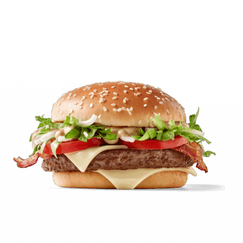 Ein saftiger Hamburger mit Sesambrötchen, frisch geschnittenem Gemüse und Käse.