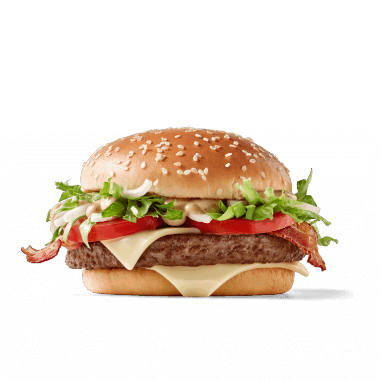 Ein saftiger Hamburger mit Sesambrötchen, frisch geschnittenem Gemüse und Käse.
