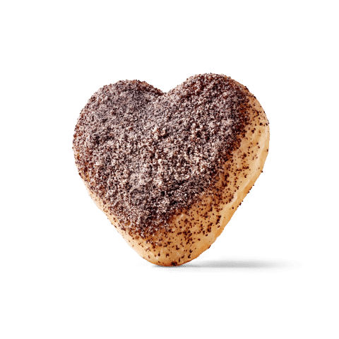 Ein herzförmiger Keks mit einer schokoladigen Beschichtung aus Kaffeepulver