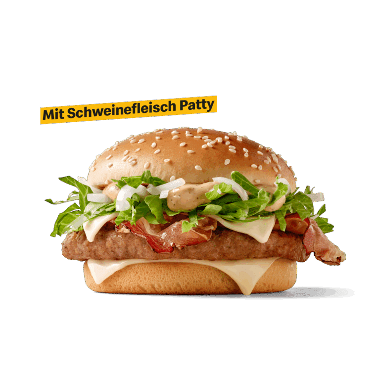 Ein saftiger Burger mit Schweinefleisch Patty, frischem Salat, Zwiebeln und einer cremigen Sauce auf einem Sesambrötchen.