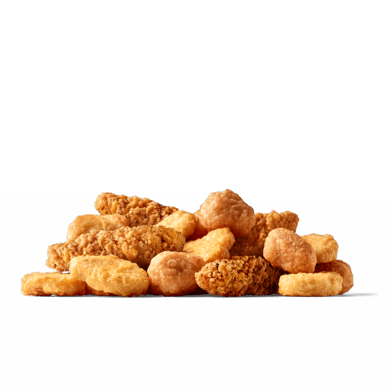 Eine Vielzahl von knusprigen Hühnernuggets.