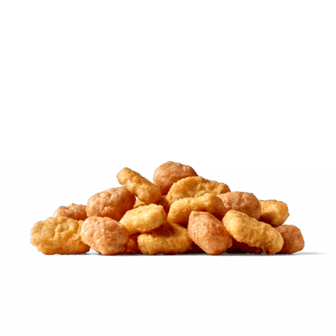 Eine Vielzahl von knusprigen Hühnernuggets.