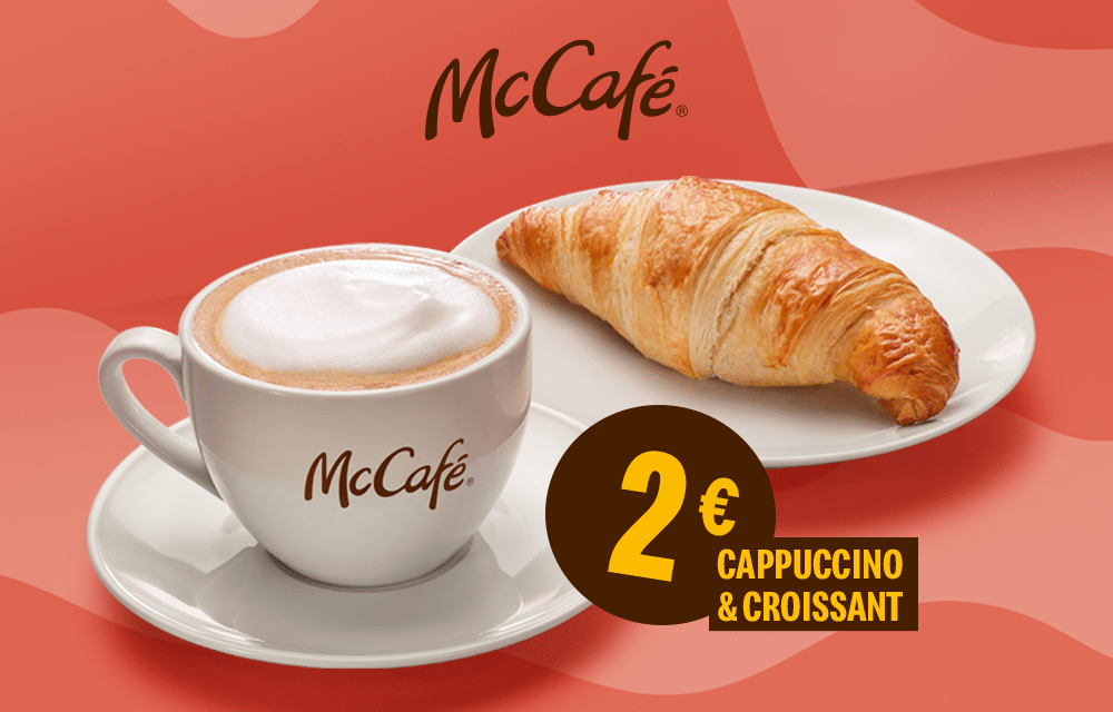Eine Tasse Cappuccino und ein Croissant im McCafé, Preis 2€