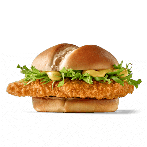 Frittierter Hähnchenburger mit Salat und Saucen auf Brötchen