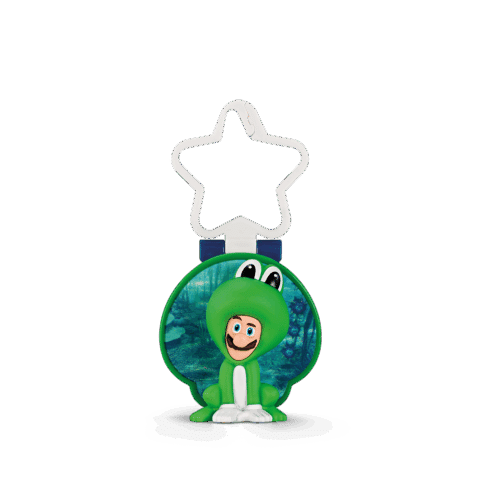 Ein grüner Anhänger mit einem lustigen Charakter im Froschkostüm und einem Sternanhänger.